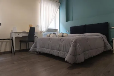 Chambre Double Deluxe avec Lit d’Appoint — Madame Pucci